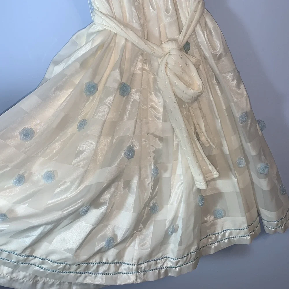 Vintage handmade girls puff sleeve white Cream Dress with Blue Floral rosette’s